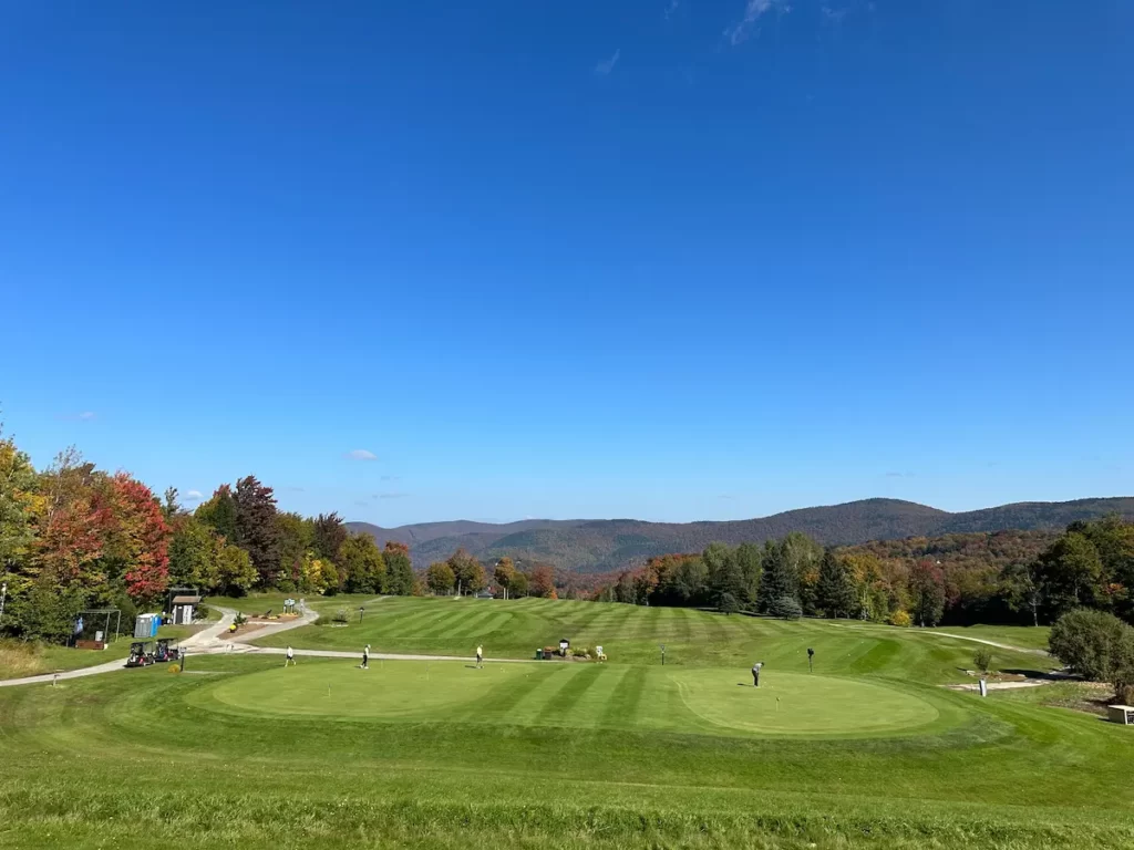image of Killington Golf course in Killington, VT with mountains in the background